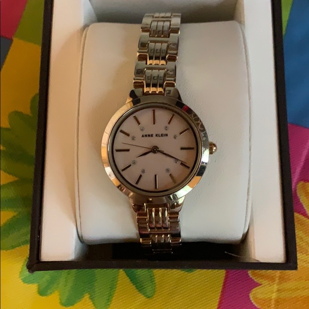 Anne Klein gold watch with pink face